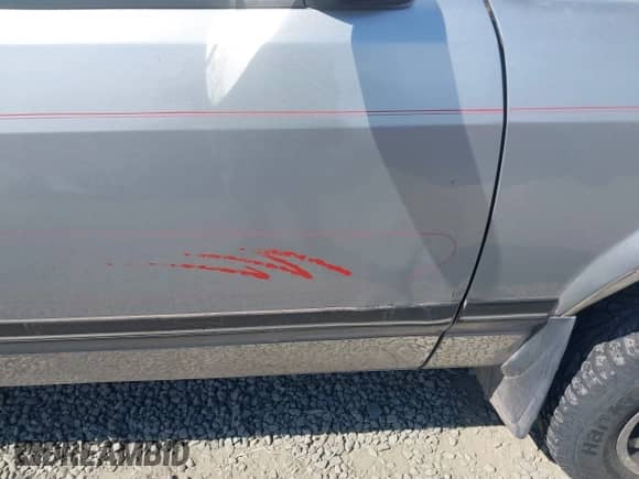 1991 Dodge Dakota z VIN 1B7GG23X9MS351515, wystawiony jako IAAI lot #42853981 z przebiegiem 197 406 mil mil oraz . Historia ofert i sprzedaży dostępna na DreamBid. Obrazek 6.