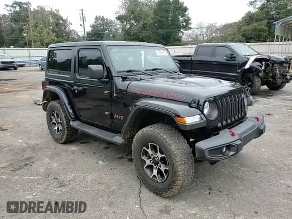 2020 Jeep Wrangler Rubicon with VIN 1C4HJXCG4LW175807, listed as a Copart auction lot 79909184 with 56,935 mi miles and Salvage title. Bid and sale history available at DreamBid. Image 10.