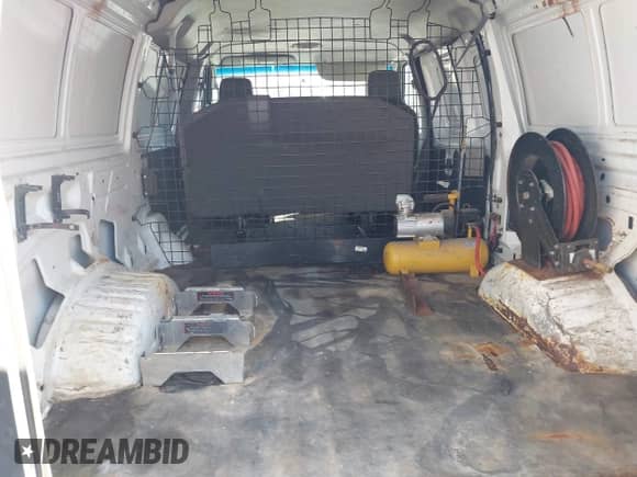 2014 Ford Econoline Cargo Commercial with VIN 1FTNE1EL7EDA59384, listed as a IAAI auction lot 43391909 with 306,342 mi miles and . Bid and sale history available at DreamBid. Image 16.