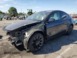 2024 Tesla Model Y Long Range with VIN 7SAYGDEE6RA250349, listed as a Copart auction lot 80730895 with 12,107 mi miles and Salvage title. Bid and sale history available at DreamBid. Image 1.