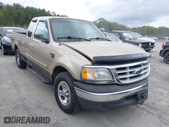 1999 Ford F-150 with VIN 1FTRX17W6XNC12675, listed as a IAAI auction lot 43338117 with 98,833 mi miles and . Bid and sale history available at DreamBid. Image 1.