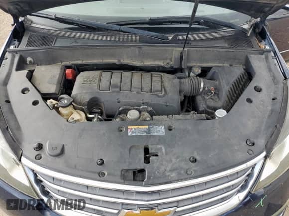 2015 Chevrolet Traverse LTZ с VIN 1GNKRJKD4FJ101718, выставлен на аукционе Copart как лот 68320795 с пробегом 211 385 миль миль и Списание • Salvage title. История ставок и продаж доступна на DreamBid. Изображение 12.