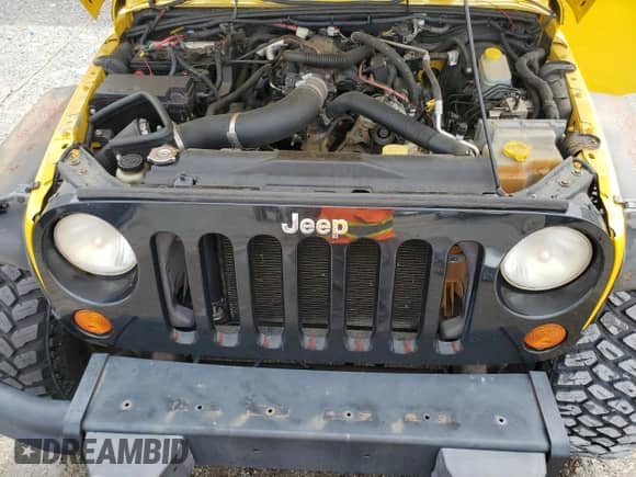 2008 Jeep Wrangler X с VIN 1J4FA24188L523695, выставлен на аукционе Copart как лот 84798675 с пробегом 83 742 миль миль и Списание • Salvage title. История ставок и продаж доступна на DreamBid. Изображение 12.