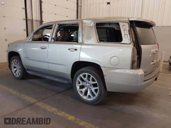 2017 Chevrolet Tahoe LT with VIN 1GNSCBKC5HR128980, listed as a IAAI auction lot 42644191 with 203,635 mi miles and . Bid and sale history available at DreamBid. Image 3.