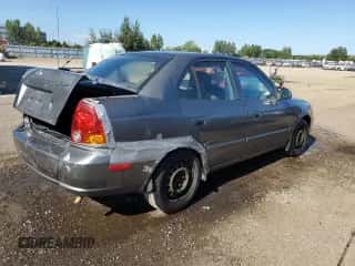 2005 Hyundai Accent GLS с VIN KMHCG45C05U605716, выставлен на аукционе Copart как лот 69445324 с пробегом 158 082 миль миль и Чистый • Clean title. История ставок и продаж доступна на DreamBid. Изображение 3.