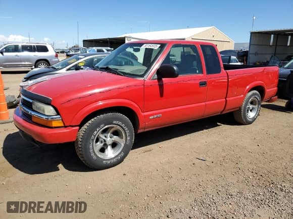 2003 Chevrolet S-10 LS with VIN 1GCCS19X038191048, listed as a Copart auction lot 80164935 with 103,558 mi miles and Salvage title. Bid and sale history available at DreamBid. Image 1.