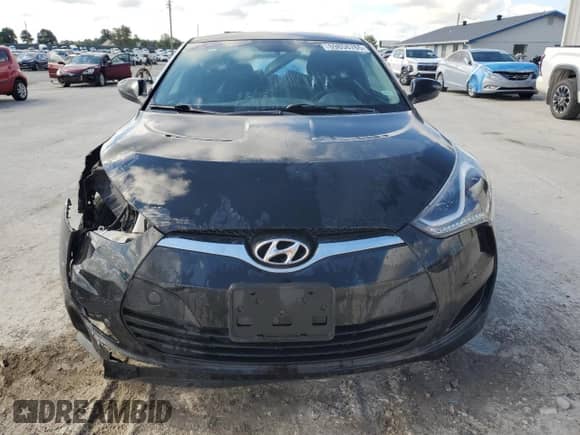 2015 Hyundai Veloster z VIN KMHTC6AD0FU237545, wystawiony jako Copart lot #69858765 z przebiegiem 182 058 mil mil oraz Szkoda całkowita • Salvage title. Historia ofert i sprzedaży dostępna na DreamBid. Obrazek 5.