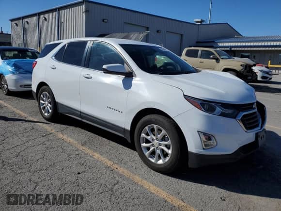 2018 Chevrolet Equinox LT with VIN 2GNAXJEV2J6213963, listed as a Copart auction lot 87484915 with 58,259 mi miles and Salvage title. Bid and sale history available at DreamBid. Image 4.