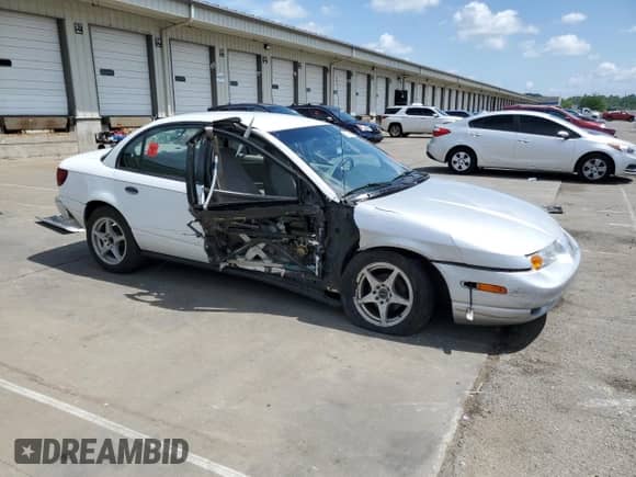 2000 Saturn SL with VIN 1G8ZH528XYZ239041, listed as a Copart auction lot 63677965 with 175,571 mi miles and Salvage title. Bid and sale history available at DreamBid. Image 4.