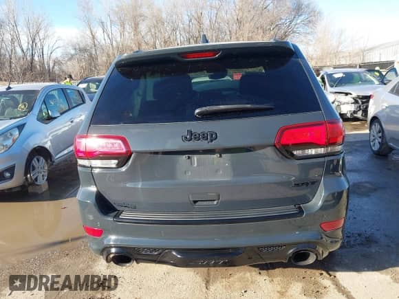 2018 Jeep Grand Cherokee SRT с VIN 1C4RJFDJ9JC382328, выставлен на аукционе IAAI как лот 41620799 с пробегом 70 762 миль миль и . История ставок и продаж доступна на DreamBid. Изображение 17.
