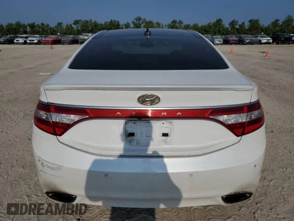 2013 Hyundai Azera с VIN KMHFH4JG4DA233042, выставлен на аукционе Copart как лот 66947014 с пробегом 176 177 миль миль и Чистый • Clean title. История ставок и продаж доступна на DreamBid. Изображение 6.