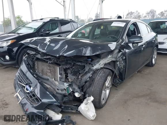 2015 Volvo S60 T5 Drive-E Premier with VIN YV126MFB0F2301169, listed as a IAAI auction lot 42500241 with 71,732 mi miles and . Bid and sale history available at DreamBid. Image 2.