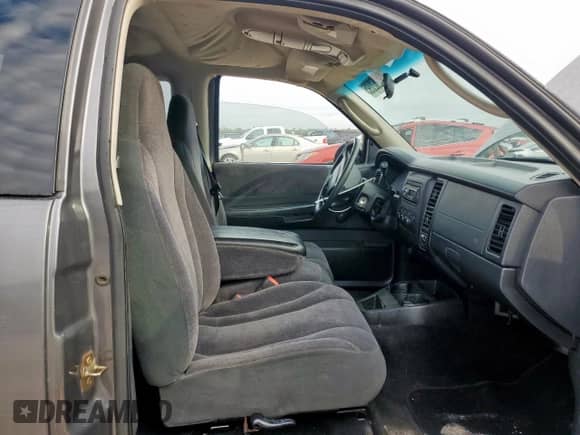 2001 Dodge Dakota z VIN 1B7GL22X91S341785, wystawiony jako Copart lot #90262095 z przebiegiem 164 468 mil mil oraz Szkoda całkowita • Salvage title. Historia ofert i sprzedaży dostępna na DreamBid. Obrazek 7.