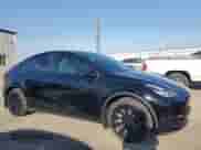 2022 Tesla Model Y Long Range с VIN 7SAYGAEE2NF417561, выставлен на аукционе Copart как лот 84251505 с пробегом 30 145 миль миль и Списание • Salvage title. История ставок и продаж доступна на DreamBid. Изображение 4.