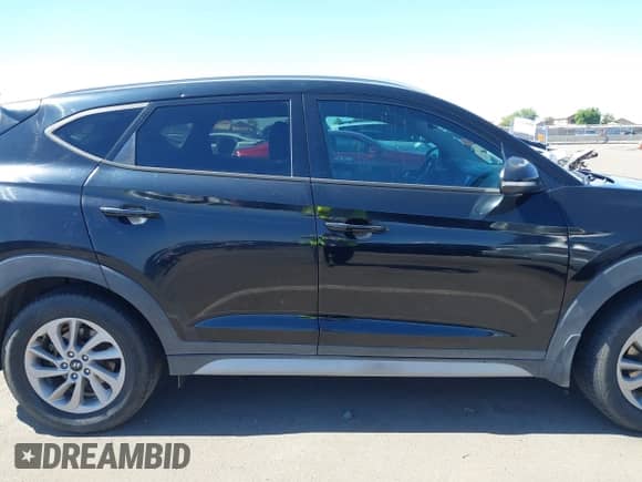 2017 Hyundai Tucson SE with VIN KM8J33A49HU528764, listed as a IAAI auction lot 43330824 with 124,630 mi miles and . Bid and sale history available at DreamBid. Image 13.