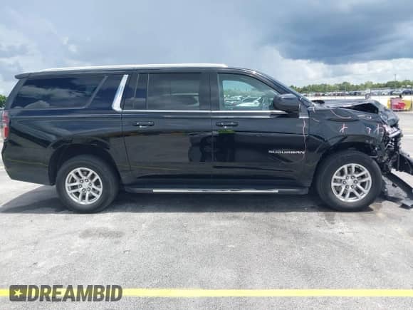 2023 Chevrolet Suburban LT z VIN 1GNSKCKD4PR382714, wystawiony jako IAAI lot #42739708 z przebiegiem 58 318 mil mil oraz . Historia ofert i sprzedaży dostępna na DreamBid. Obrazek 13.