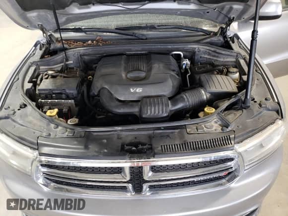 2014 Dodge Durango SXT with VIN 1C4RDJAGXEC345748, listed as a Copart auction lot 84184445 with 194,131 mi miles and Clean title. Bid and sale history available at DreamBid. Image 12.