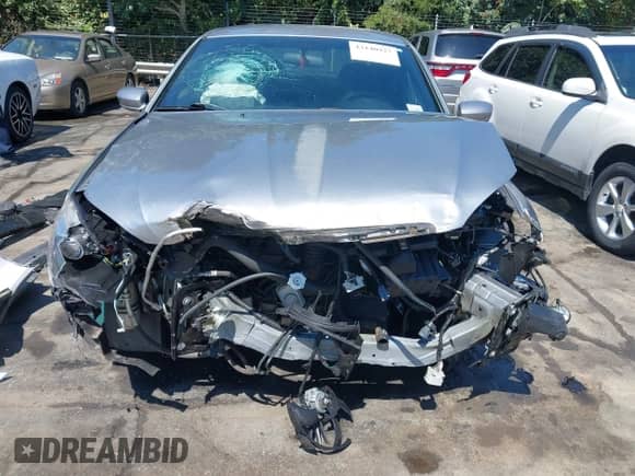 2013 Chrysler 200 Touring with VIN 1C3CCBBBXDN595936, listed as a IAAI auction lot 43140927 with 140,617 mi miles and . Bid and sale history available at DreamBid. Image 12.