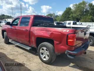 2018 Chevrolet Silverado 1500 LT z VIN 3GCUKREC4JG155439, wystawiony jako Copart lot #86126245 z przebiegiem 125 987 mil mil oraz Szkoda całkowita • Salvage title. Historia ofert i sprzedaży dostępna na DreamBid. Obrazek 2.