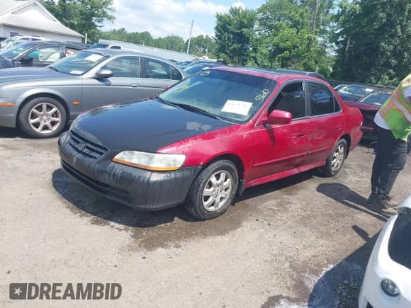 2002 Honda Accord EX with VIN 1HGCG56682A034543, listed as a IAAI auction lot 42673776 with 200,896 mi miles and . Bid and sale history available at DreamBid. Image 17.
