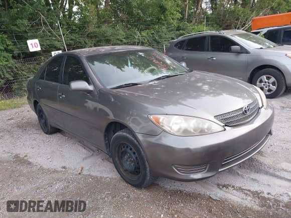 2005 Toyota Camry STD with VIN 4T1BE32K05U640893, listed as a IAAI auction lot 42909908 with 155,257 mi miles and . Bid and sale history available at DreamBid. Image 1.