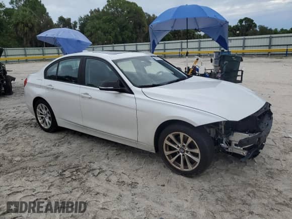 2017 BMW 3 Series 320i with VIN WBA8E1G53HNU13554, listed as a Copart auction lot 80698265 with 101,651 mi miles and Salvage title. Bid and sale history available at DreamBid. Image 4.