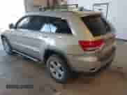 2012 Jeep Grand Cherokee Laredo with VIN 1C4RJFAG8CC153943, listed as a IAAI auction lot 43371764 with 218,266 mi miles and . Bid and sale history available at DreamBid. Image 3.