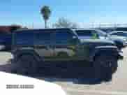 2022 Jeep Wrangler Unlimited Sport with VIN 1C4HJXDG5NW113205, listed as a IAAI auction lot 41836171 with 30,446 mi miles and . Bid and sale history available at DreamBid. Image 14.