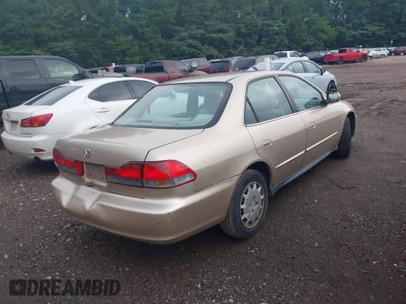 2002 Honda Accord LX with VIN 1HGCG55462A108462, listed as a IAAI auction lot 42515819 with 260,945 mi miles and . Bid and sale history available at DreamBid. Image 4.