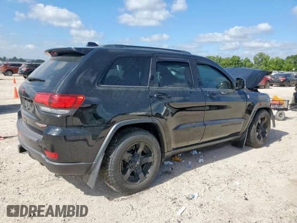 2020 Jeep Grand Cherokee Trailhawk z VIN 1C4RJFLG9LC378045, wystawiony jako Copart lot #65974455 z przebiegiem 76 740 mil mil oraz Szkoda całkowita • Salvage title. Historia ofert i sprzedaży dostępna na DreamBid. Obrazek 3.