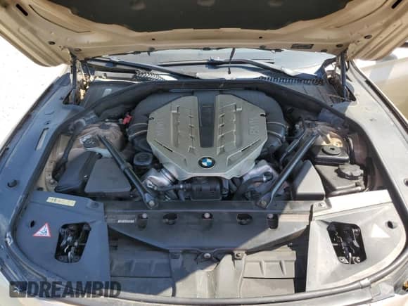 2010 BMW 7 Series 750Li xDrive with VIN WBAKC8C59AC430192, listed as a Copart auction lot 64105935 with 103,657 mi miles and Salvage title. Bid and sale history available at DreamBid. Image 11.