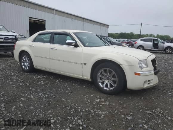 2007 Chrysler 300 C with VIN 2C3KA63H27H748527, listed as a Copart auction lot 55078975 with 149,096 mi miles and Salvage title. Bid and sale history available at DreamBid. Image 4.
