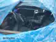 1998 Ford Econoline Cargo Recreational z VIN 1FDRE14L2WHC06042, wystawiony jako Copart lot #55794955 z przebiegiem 102 398 mil mil oraz Szkoda całkowita • Salvage title. Historia ofert i sprzedaży dostępna na DreamBid. Obrazek 7.