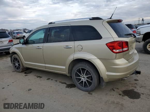 2011 Dodge Journey LUX with VIN 3D4PH9FG9BT522991, listed as a Copart auction lot 87270714 with 101,661 mi miles and Salvage title. Bid and sale history available at DreamBid. Image 2.