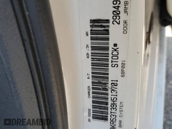 2009 Dodge Charger R/T with VIN 2B3KA53T39H513701, listed as a Copart auction lot 68700635 with 203,541 mi miles and Salvage title. Bid and sale history available at DreamBid. Image 12.