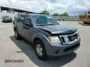 2011 Nissan Pathfinder S z VIN 5N1AR1NN5BC631134, wystawiony jako Copart lot #65801105 z przebiegiem 183 962 mil mil oraz Szkoda całkowita • Salvage title. Historia ofert i sprzedaży dostępna na DreamBid. Obrazek 13.