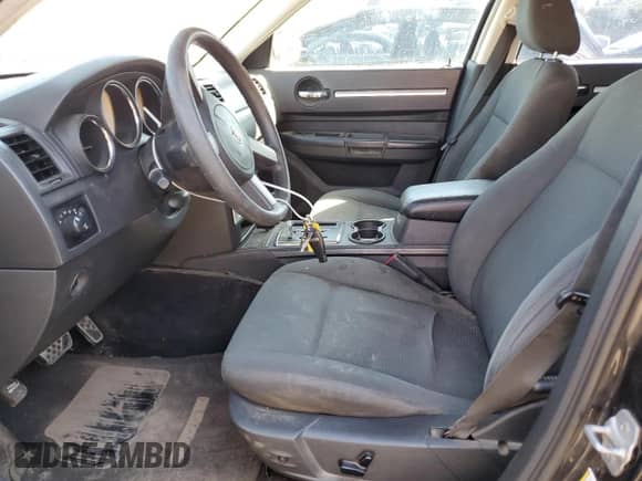 2010 Dodge Charger SXT z VIN 2B3CA3CV9AH210274, wystawiony jako Copart lot #74743934 z przebiegiem 182 675 mil mil oraz Szkoda całkowita • Salvage title. Historia ofert i sprzedaży dostępna na DreamBid. Obrazek 7.