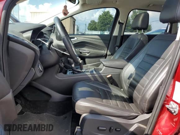 2017 Ford Escape Titanium with VIN 1FMCU9JD4HUD09865, listed as a Copart auction lot 68383735 with 136,198 mi miles and Clean title. Bid and sale history available at DreamBid. Image 7.