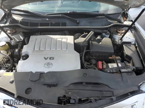 2010 Toyota Camry XLE with VIN 4T1BK3EKXAU103785, listed as a Copart auction lot 82206195 with 118,312 mi miles and Salvage title. Bid and sale history available at DreamBid. Image 11.