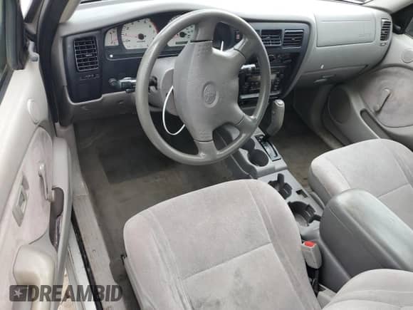 2002 Toyota Tacoma с VIN 5TENL42N42Z010806, выставлен на аукционе Copart как лот 84645105 с пробегом 199 343 миль миль и Списание • Salvage title. История ставок и продаж доступна на DreamBid. Изображение 8.