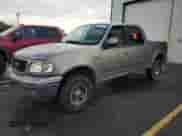 2003 Ford F-150 XLT z VIN 1FTRW08L53KB97258, wystawiony jako Copart lot #86305875 z przebiegiem Nie podano mil oraz Czysty tytuł • Clean title. Historia ofert i sprzedaży dostępna na DreamBid. Obrazek 1.