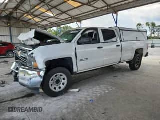 2015 Chevrolet Silverado 2500HD Work Truck z VIN 1GC1CUEG8FF145785, wystawiony jako Copart lot #70981665 z przebiegiem 247 850 mil mil oraz Szkoda całkowita • Salvage title. Historia ofert i sprzedaży dostępna na DreamBid. Obrazek 1.