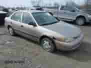 1999 Chevrolet Prizm z VIN 1Y1SK5488XZ446950, wystawiony jako IAAI lot #41798129 z przebiegiem 292 798 mil mil oraz . Historia ofert i sprzedaży dostępna na DreamBid. Obrazek 1.