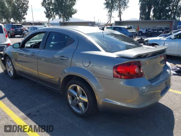 2012 Dodge Avenger SXT Plus with VIN 1C3CDZEG6CN325811, listed as a IAAI auction lot 43247091 with 200,293 mi miles and . Bid and sale history available at DreamBid. Image 3.