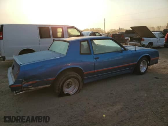 1984 Chevrolet Monte Carlo с VIN 1G1AZ37GXER137103, выставлен на аукционе Copart как лот 74534514 с пробегом Не указан миль и Чистый • Clean title. История ставок и продаж доступна на DreamBid. Изображение 3.