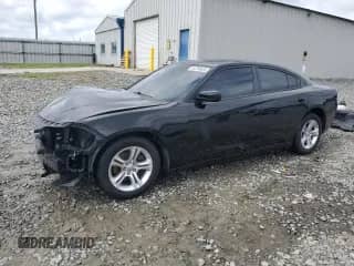2017 Dodge Charger SE with VIN 2C3CDXBG4HH514711, listed as a Copart auction lot 64786835 with 167,054 mi miles and Salvage title. Bid and sale history available at DreamBid. Image 1.