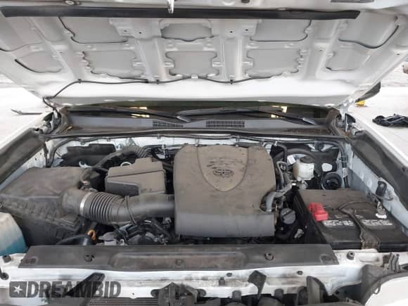 2021 Toyota Tacoma SR with VIN 3TYSZ5AN4MT044869, listed as a IAAI auction lot 41413459 with 62,446 mi miles and . Bid and sale history available at DreamBid. Image 10.