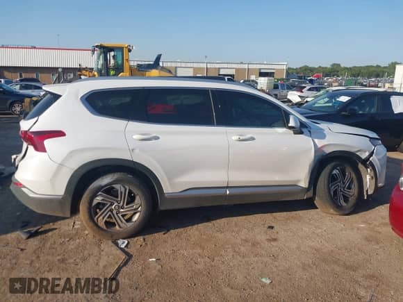 2021 Hyundai Santa Fe SEL z VIN 5NMS24AJ6MH318230, wystawiony jako IAAI lot #43106688 z przebiegiem 63 291 mil mil oraz . Historia ofert i sprzedaży dostępna na DreamBid. Obrazek 13.