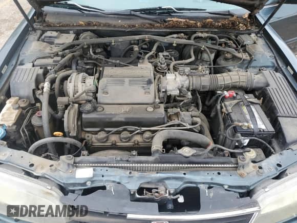 1997 Honda Accord with VIN 1HGCE6641VA021213, listed as a Copart auction lot 70542035 with 198,076 mi miles and Salvage title. Bid and sale history available at DreamBid. Image 11.