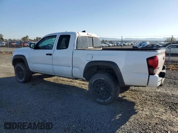 2019 Toyota Tacoma SR5 with VIN 5TFSZ5AN5KX171519, listed as a Copart auction lot 80102435 with 191,414 mi miles and Salvage title. Bid and sale history available at DreamBid. Image 2.